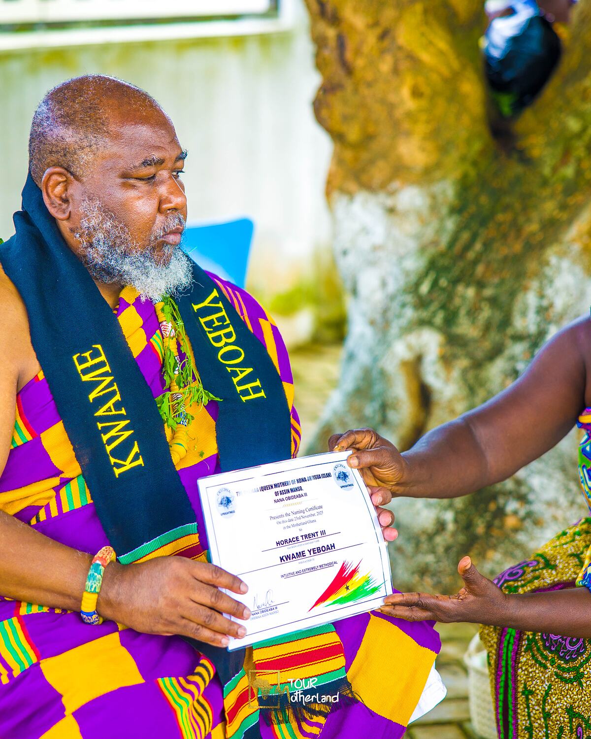 A name conferred: the certificate handed over by the queen mother